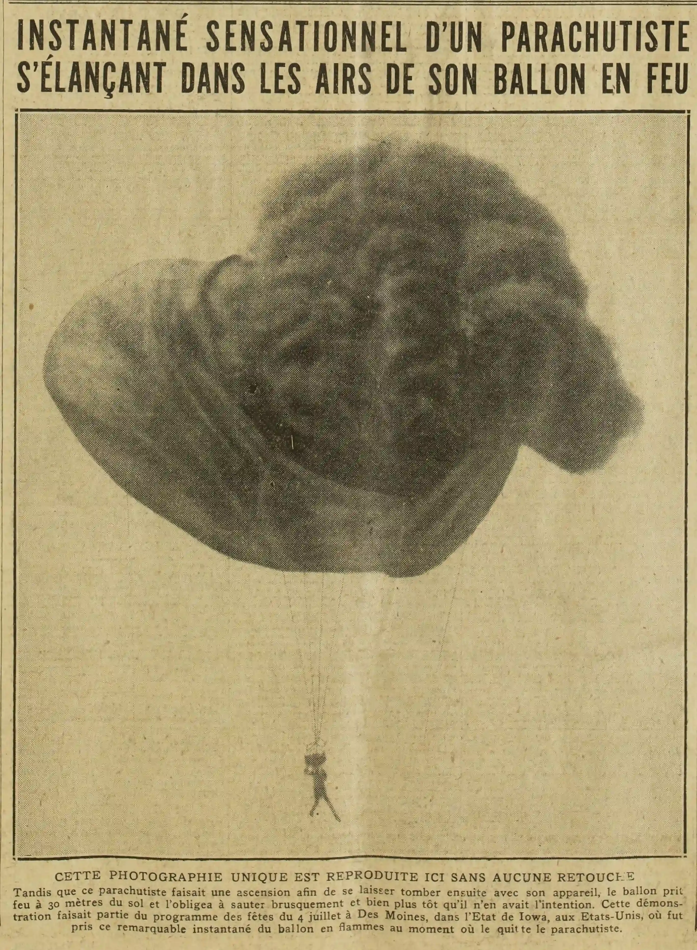 A parachutist launching himself into the air from his burning balloon. A sensational photograph.